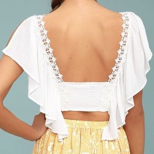 Lulu‘s Saturday night in the park white lace crop top.